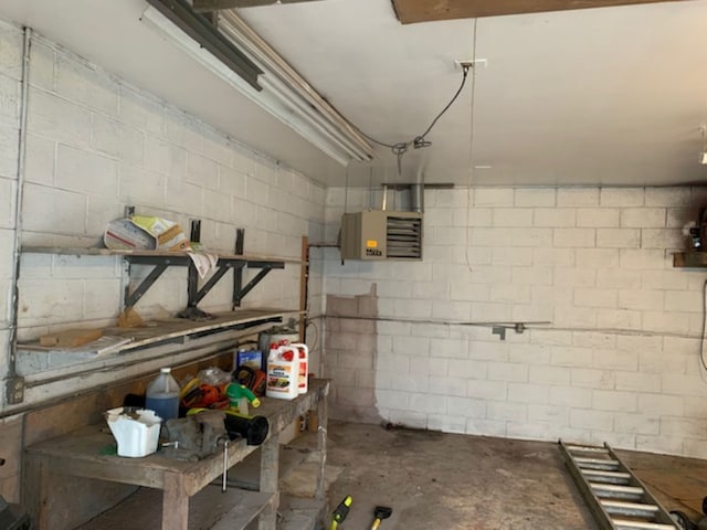 below grade area with concrete block wall