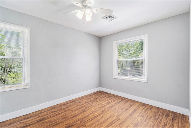 604 Montana Ave, Pontiac, MI 48341 - unfurnished room with baseboards, wood finished floors, and ceiling fan