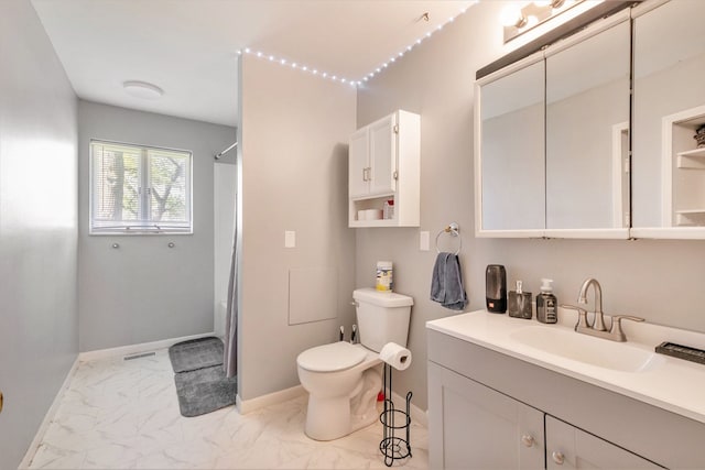 bathroom with marble finish flooring, toilet, vanity, baseboards, and a shower with shower curtain