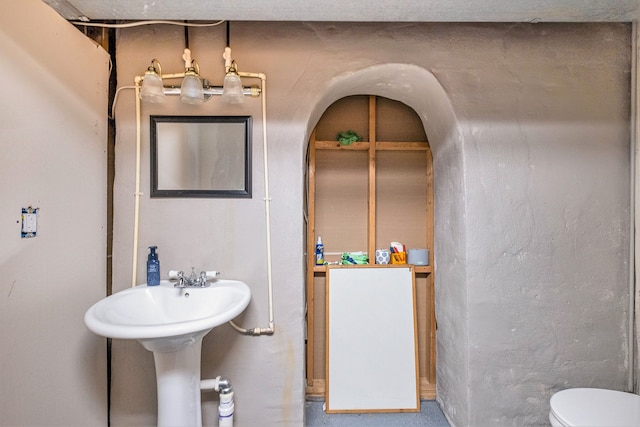 bathroom featuring toilet