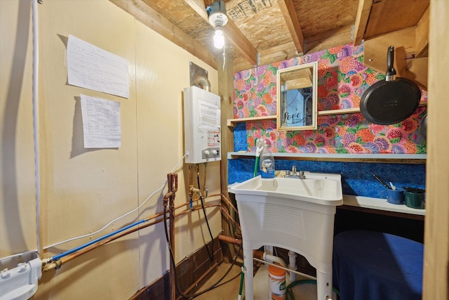 dining area with water heater and wallpapered walls