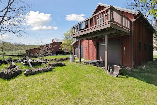 back of house featuring a wooden deck