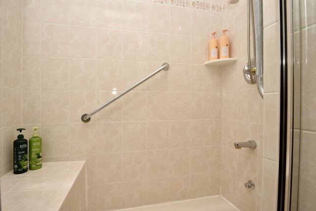 full bathroom featuring a stall shower
