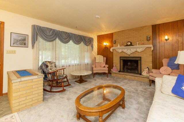 70765 Carter Ave, Niles, MI 49120 - carpeted living room with a fireplace and wooden walls