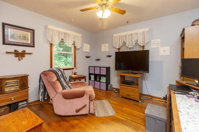70765 Carter Ave, Niles, MI 49120 - living room featuring baseboards, light wood-style flooring, and ceiling fan
