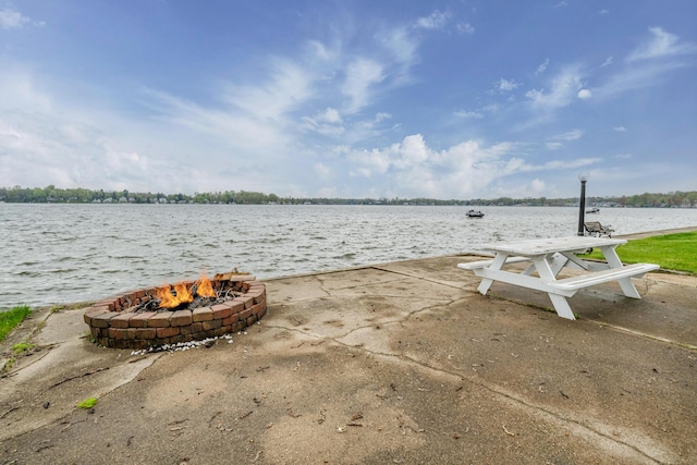 view of water feature featuring a fire pit