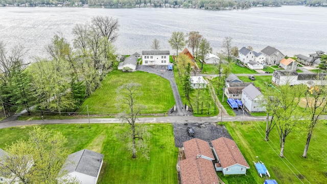 aerial view featuring a water view and a residential view