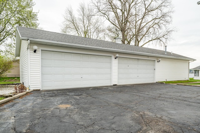 garage with driveway