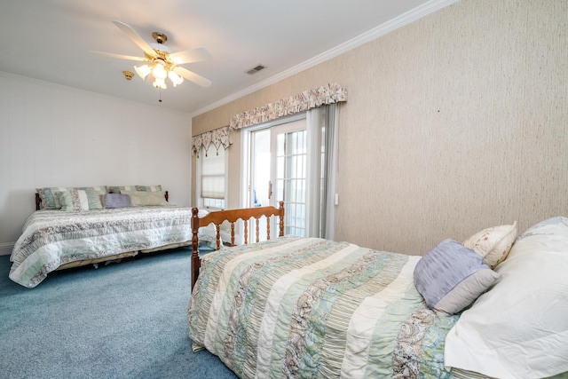 carpeted bedroom featuring crown molding, a ceiling fan, and visible vents