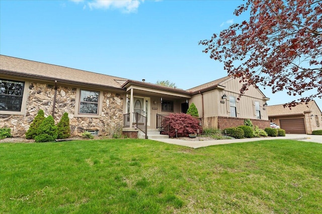 single story home featuring a front yard, stone siding, and driveway