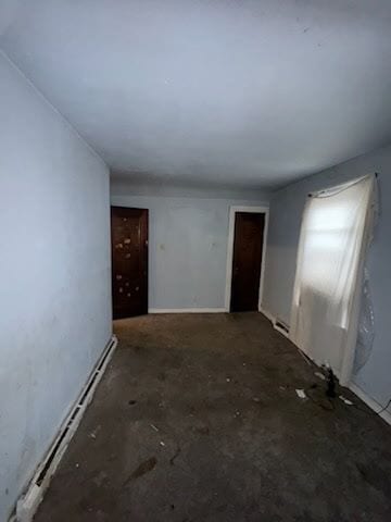 spare room with a baseboard radiator