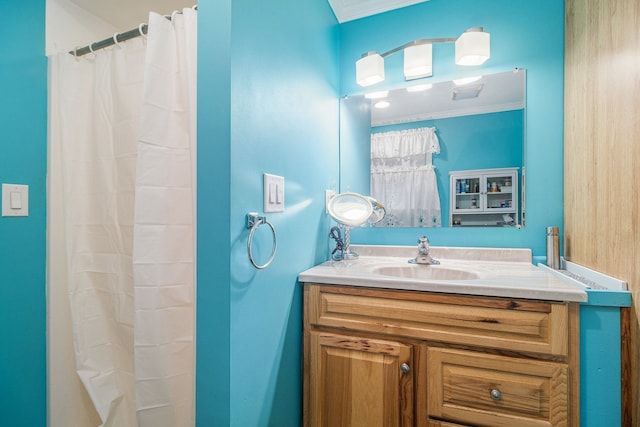 full bath with vanity, ornamental molding, and a shower with curtain