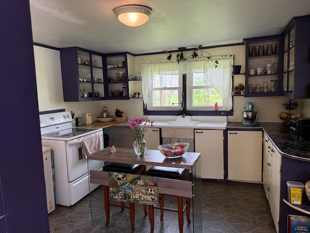 kitchen with white electric range oven, open shelves, glass insert cabinets, crown molding, and dark countertops