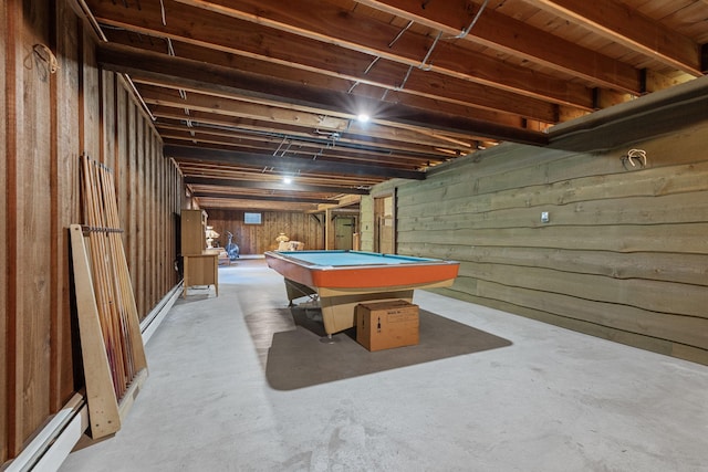 rec room featuring unfinished concrete flooring, pool table, and baseboard heating