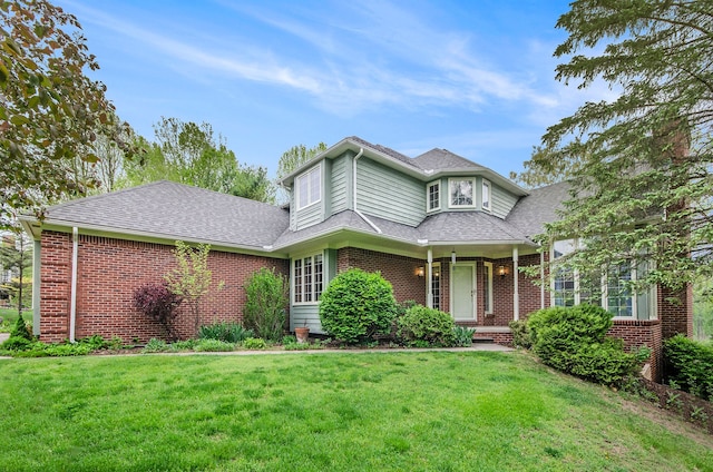 5401 Lone Pine Ct, Brighton, MI 48116 - view of front of property with brick siding, a front yard, and a shingled roof