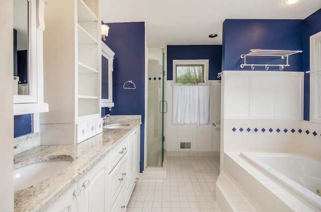 5401 Lone Pine Ct, Brighton, MI 48116 - bathroom with a stall shower, double vanity, tile patterned floors, and a bath