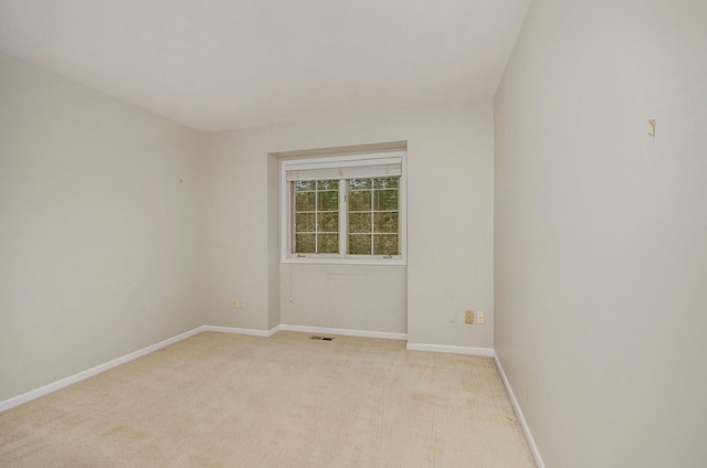 5401 Lone Pine Ct, Brighton, MI 48116 - spare room featuring light colored carpet and baseboards