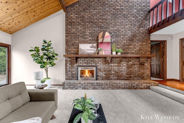 living room featuring a brick fireplace, carpet flooring, baseboards, and high vaulted ceiling