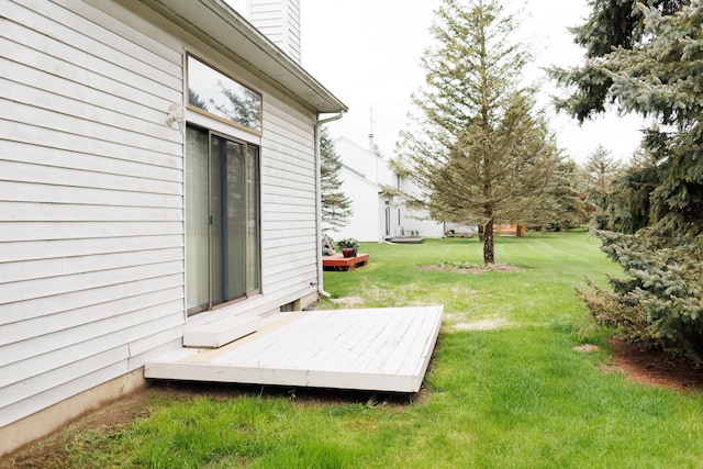 view of yard featuring a wooden deck