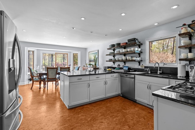 3370 Breezewood, Ortonville, MI 48462 - kitchen with stainless steel appliances, open shelves, a sink, a peninsula, and recessed lighting