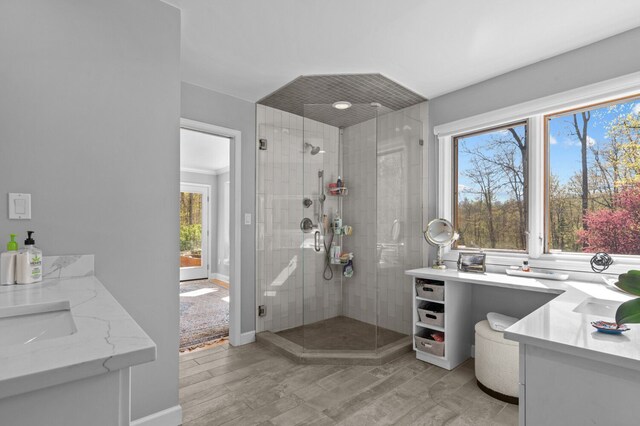 3370 Breezewood, Ortonville, MI 48462 - bathroom with a stall shower, healthy amount of natural light, baseboards, and wood finished floors