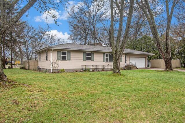 2737 Patricia Dr, Muskegon, MI 49445 - single story home with a garage