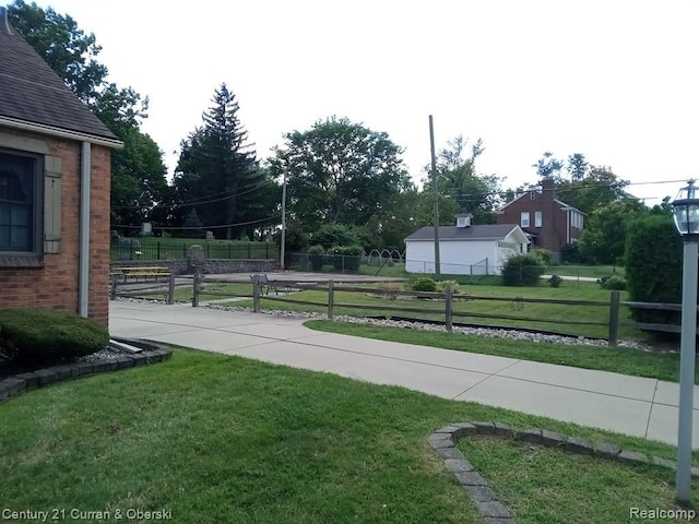 23211 Myrtle St, Dearborn, MI 48128 - view of yard featuring fence