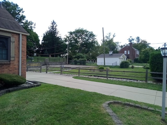 23211 Myrtle St, Dearborn, MI 48128 - view of yard featuring fence