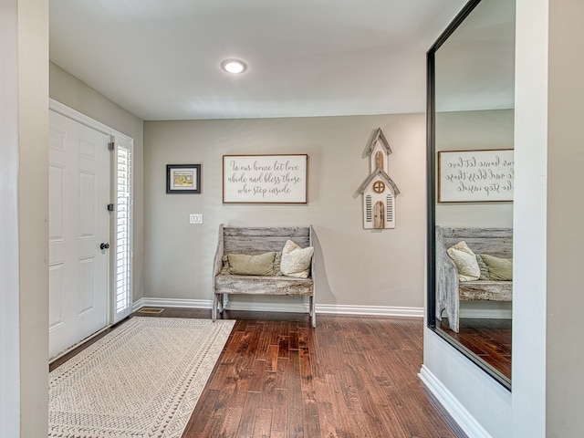 foyer entrance featuring recessed lighting, baseboards, and wood finished floors