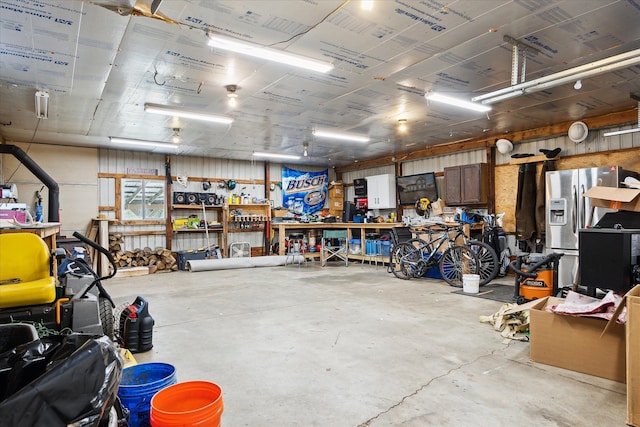garage with a workshop area