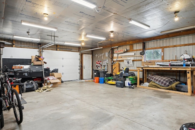 garage with a workshop area