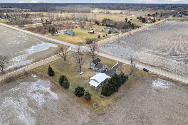 birds eye view of property with a rural view