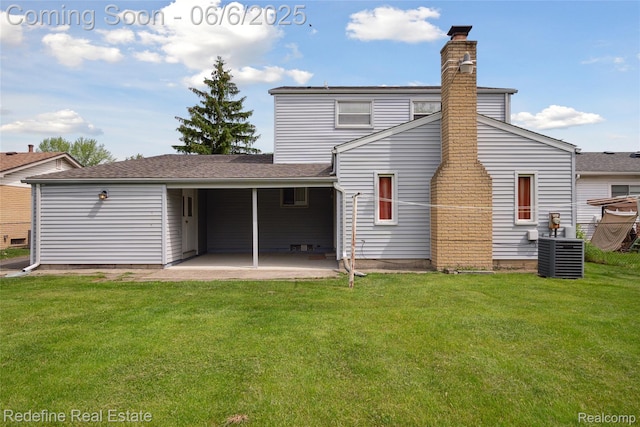42127 Addison Ave, Canton, MI 48187 - rear view of property with central AC unit, a patio area, a yard, and a chimney