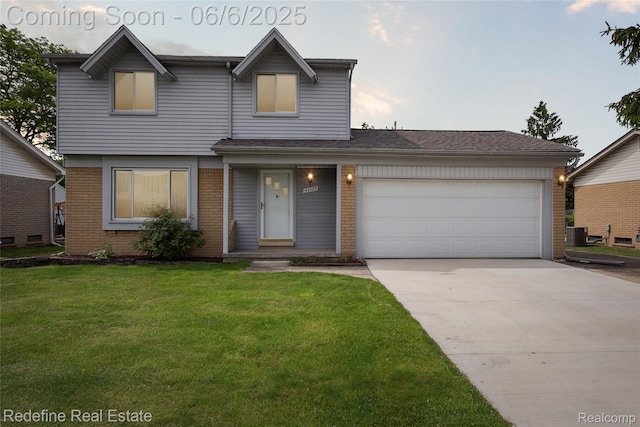 42127 Addison Ave, Canton, MI 48187 - view of front of house with brick siding, concrete driveway, an attached garage, and a front lawn
