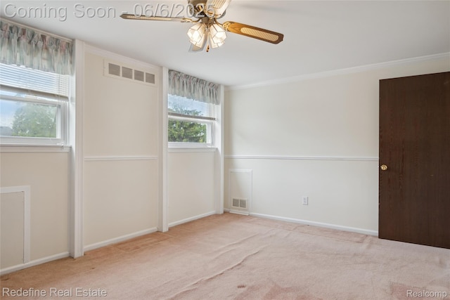 42127 Addison Ave, Canton, MI 48187 - carpeted spare room featuring a ceiling fan, crown molding, and baseboards