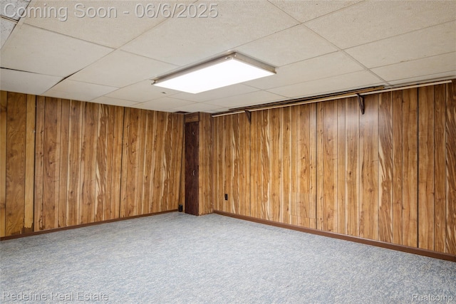 42127 Addison Ave, Canton, MI 48187 - finished below grade area with a drop ceiling, wood walls, and carpet floors