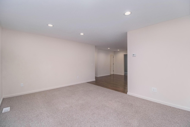 1312 Lafayette Ave, Kalamazoo, MI 49006 - spare room with carpet flooring, visible vents, baseboards, and recessed lighting