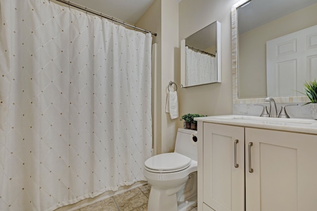 full bath featuring toilet, tile patterned flooring, vanity, and a shower with curtain