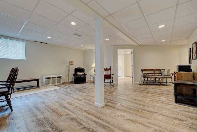 interior space featuring recessed lighting, wood finished floors, baseboards, and a paneled ceiling