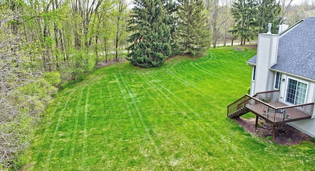 view of yard featuring a deck