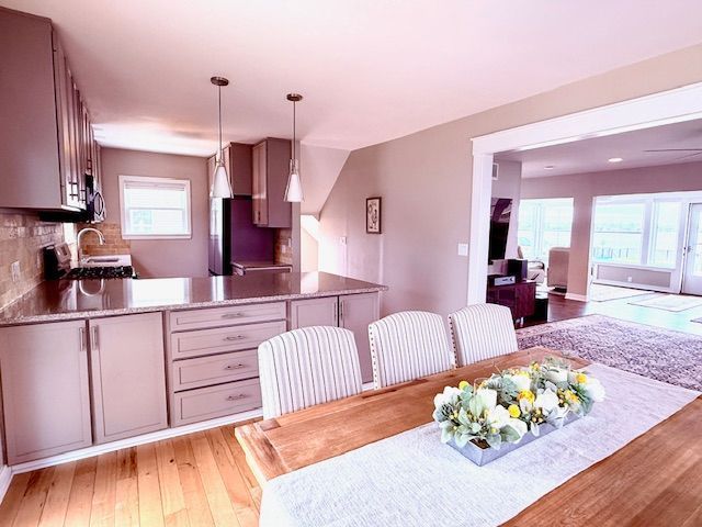 dining room with light wood finished floors