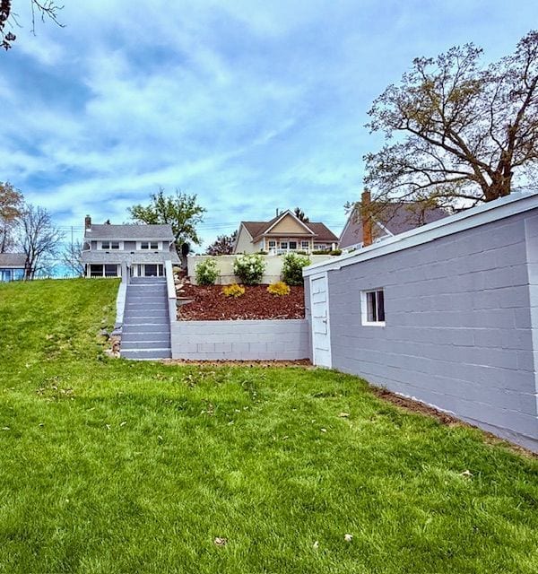 view of yard featuring stairway