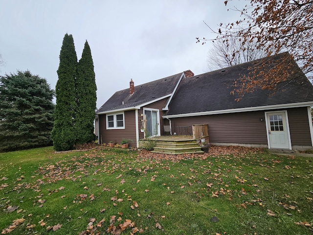 3544 Burnsline Rd, Brown City, MI 48416 - rear view of house featuring a yard, a deck, and a chimney