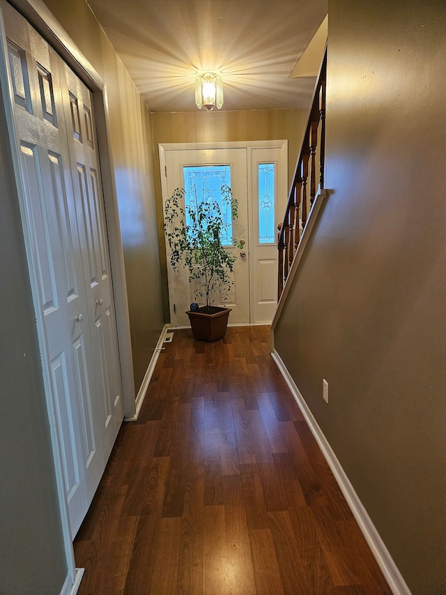 3544 Burnsline Rd, Brown City, MI 48416 - entryway with stairway, baseboards, and wood finished floors