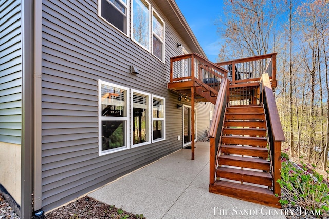exterior space featuring a patio, a deck, and stairs