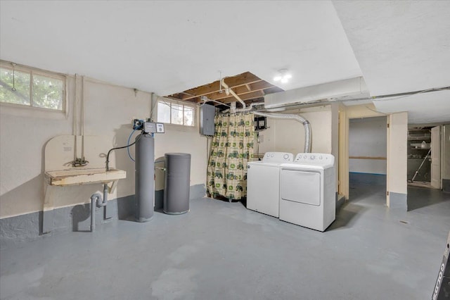 4131 Wellman Line Rd, Brown City, MI 48416 - below grade area with separate washer and dryer, a water softener system, and electric panel