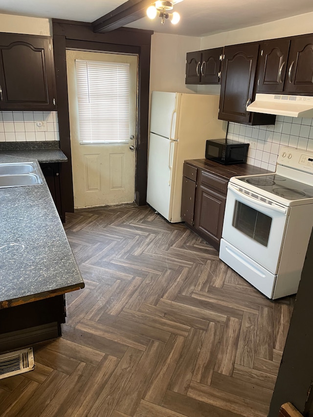 kitchen with white electric range oven, a sink, dark countertops, under cabinet range hood, and black microwave