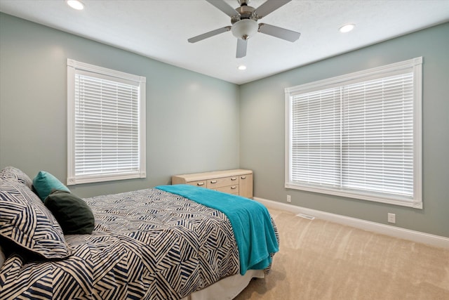 carpeted bedroom with baseboards and recessed lighting