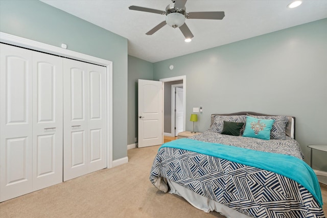 carpeted bedroom featuring a ceiling fan, baseboards, a closet, and recessed lighting