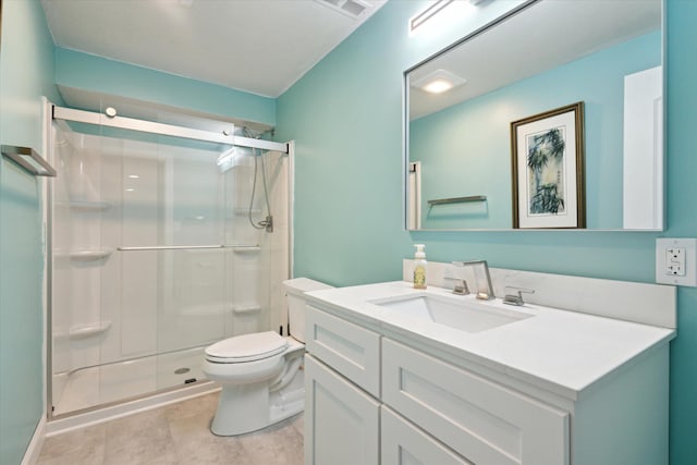 full bath featuring vanity, toilet, tile patterned flooring, and a shower stall